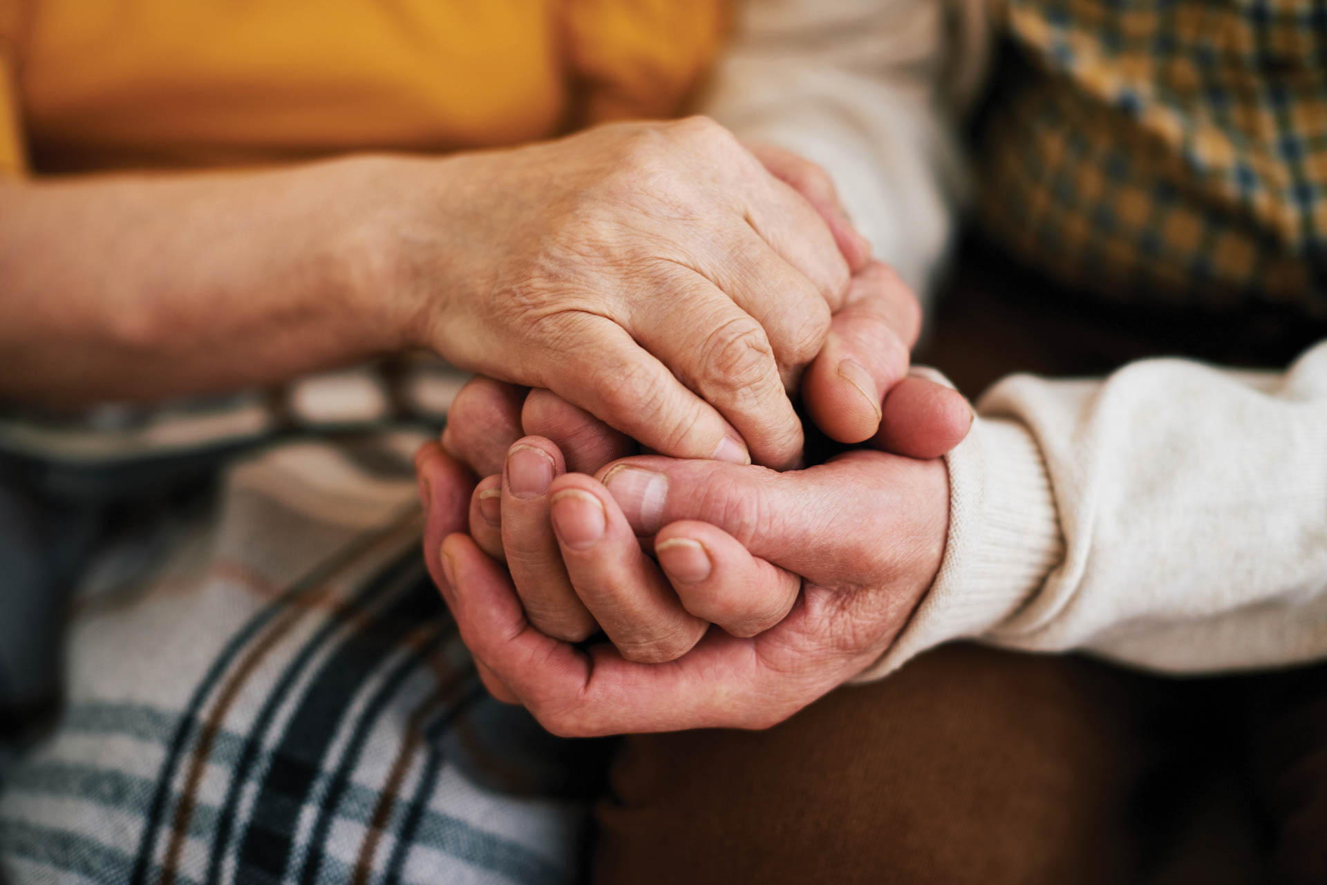 Two people holding hands.